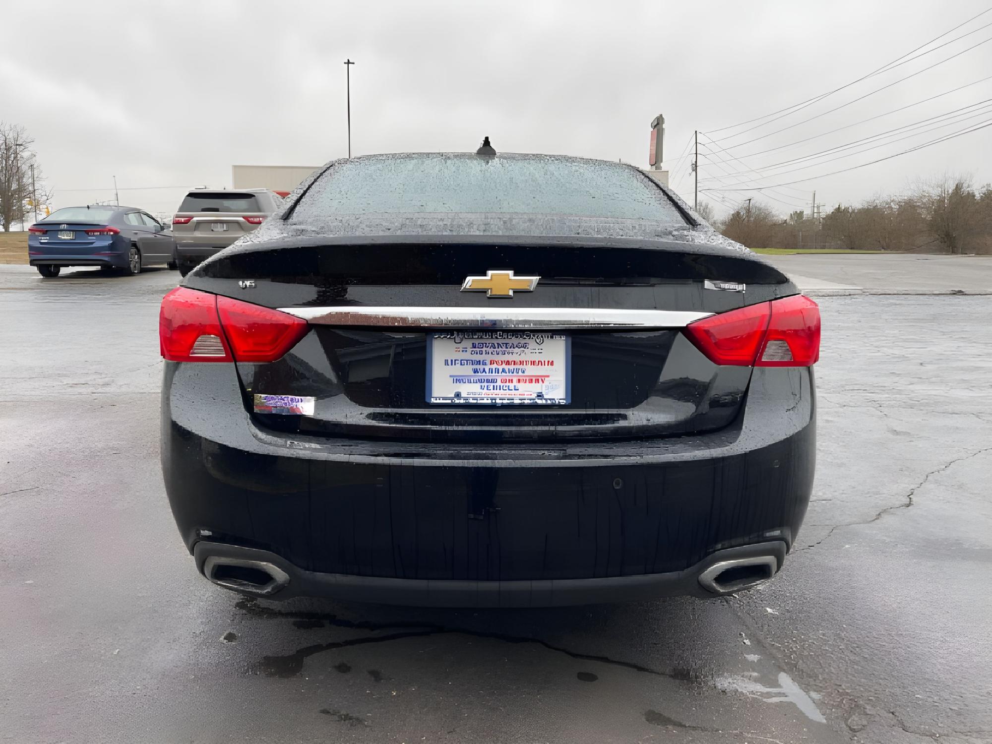 2017 Black Chevrolet Impala Premier (1G1145S32HU) with an 3.6L V6 DOHC 24V engine, 6-Speed Automatic transmission, located at 1184 Kauffman Ave, Fairborn, OH, 45324, (937) 908-9800, 39.807072, -84.030914 - Photo #11