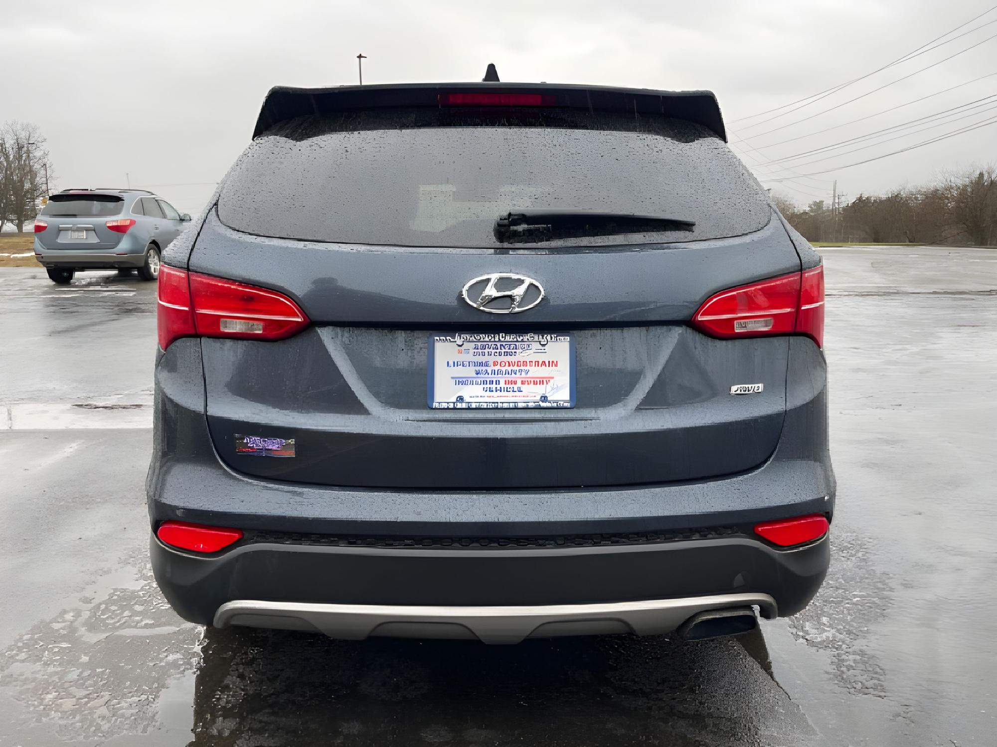 2016 Marlin Blue Hyundai Santa Fe Sport 2.4 AWD (5XYZTDLB9GG) with an 2.4L L4 DOHC 16V engine, 6-Speed Automatic transmission, located at 4508 South Dixie Dr, Moraine, OH, 45439, (937) 908-9800, 39.689976, -84.218452 - Photo #11