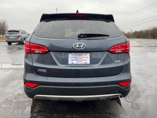 2016 Marlin Blue Hyundai Santa Fe Sport 2.4 AWD (5XYZTDLB9GG) with an 2.4L L4 DOHC 16V engine, 6-Speed Automatic transmission, located at 4508 South Dixie Dr, Moraine, OH, 45439, (937) 908-9800, 39.689976, -84.218452 - Photo #6