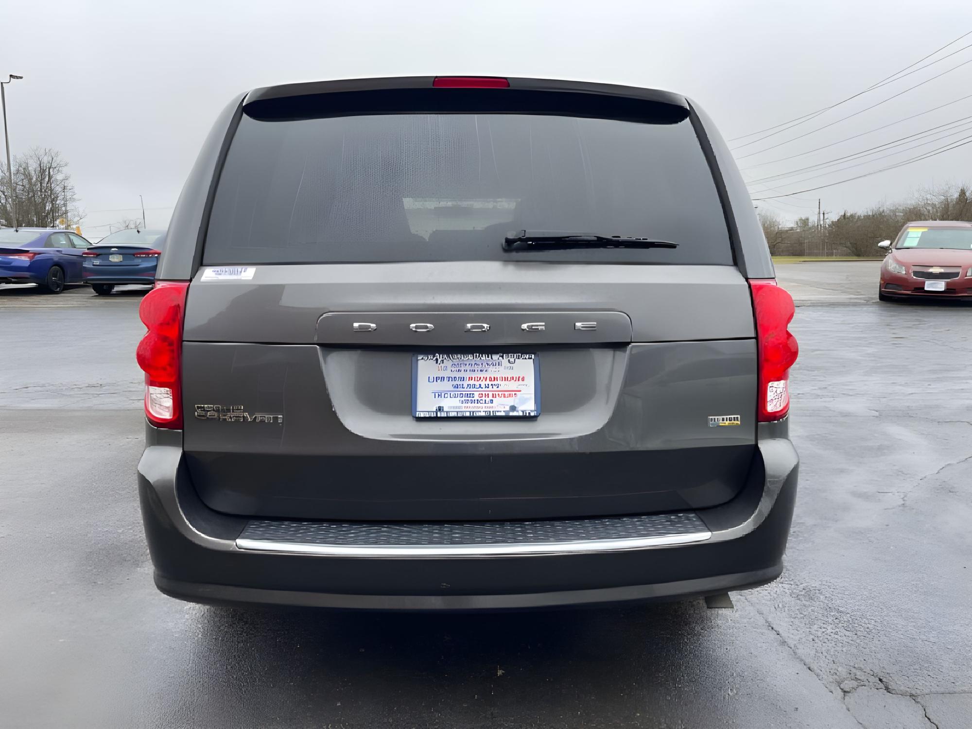 2015 Granite Crystal Met CC Dodge Grand Caravan SE (2C4RDGBG1FR) with an 3.6L V6 DOHC 24V engine, 6-Speed Automatic transmission, located at 1184 Kauffman Ave, Fairborn, OH, 45324, (937) 908-9800, 39.807072, -84.030914 - Photo #11