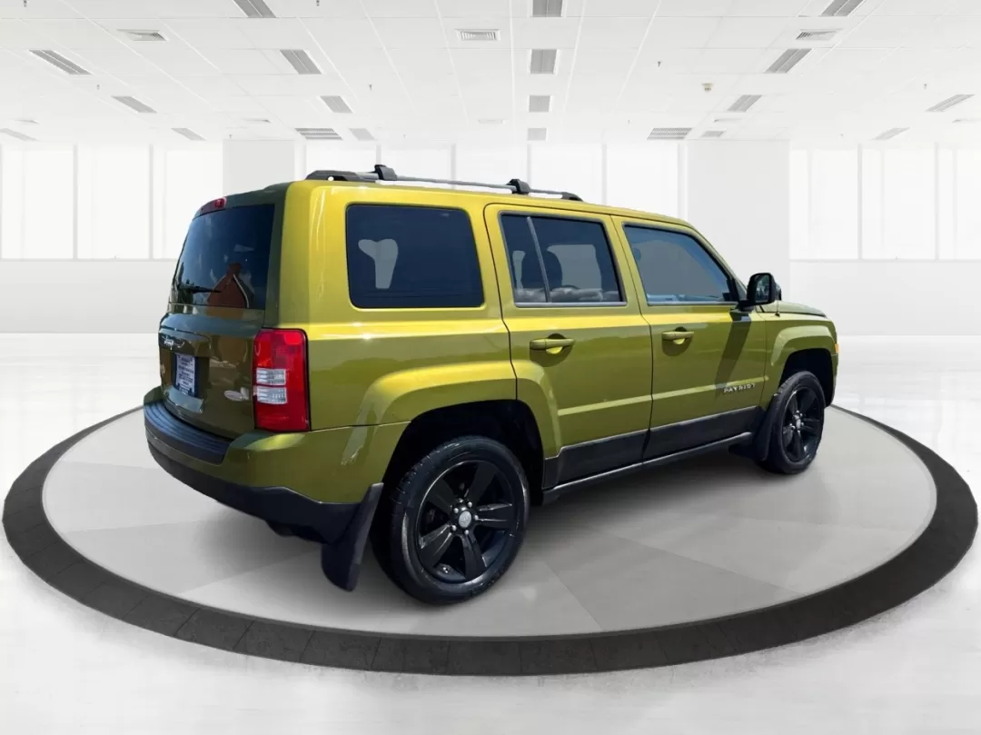 2012 Rescue Green Metallic Jeep Patriot Latitude 4WD (1C4NJRFB8CD) with an 2.4L L4 DOHC 16V engine, located at 1951 S Dayton Lakeview Rd., New Carlisle, OH, 45344, (937) 908-9800, 39.890999, -84.050255 - Photo#2