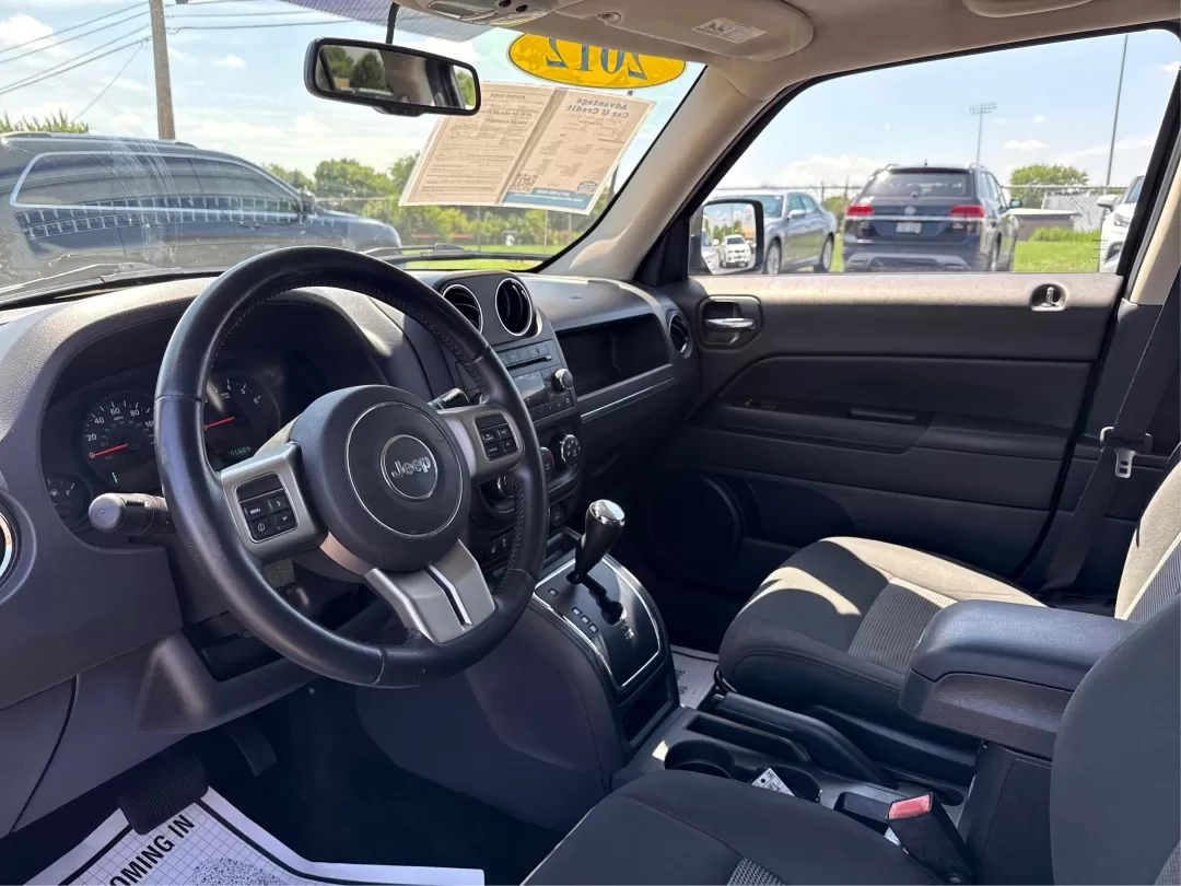 2012 Rescue Green Metallic Jeep Patriot Latitude 4WD (1C4NJRFB8CD) with an 2.4L L4 DOHC 16V engine, located at 1951 S Dayton Lakeview Rd., New Carlisle, OH, 45344, (937) 908-9800, 39.890999, -84.050255 - Photo#9