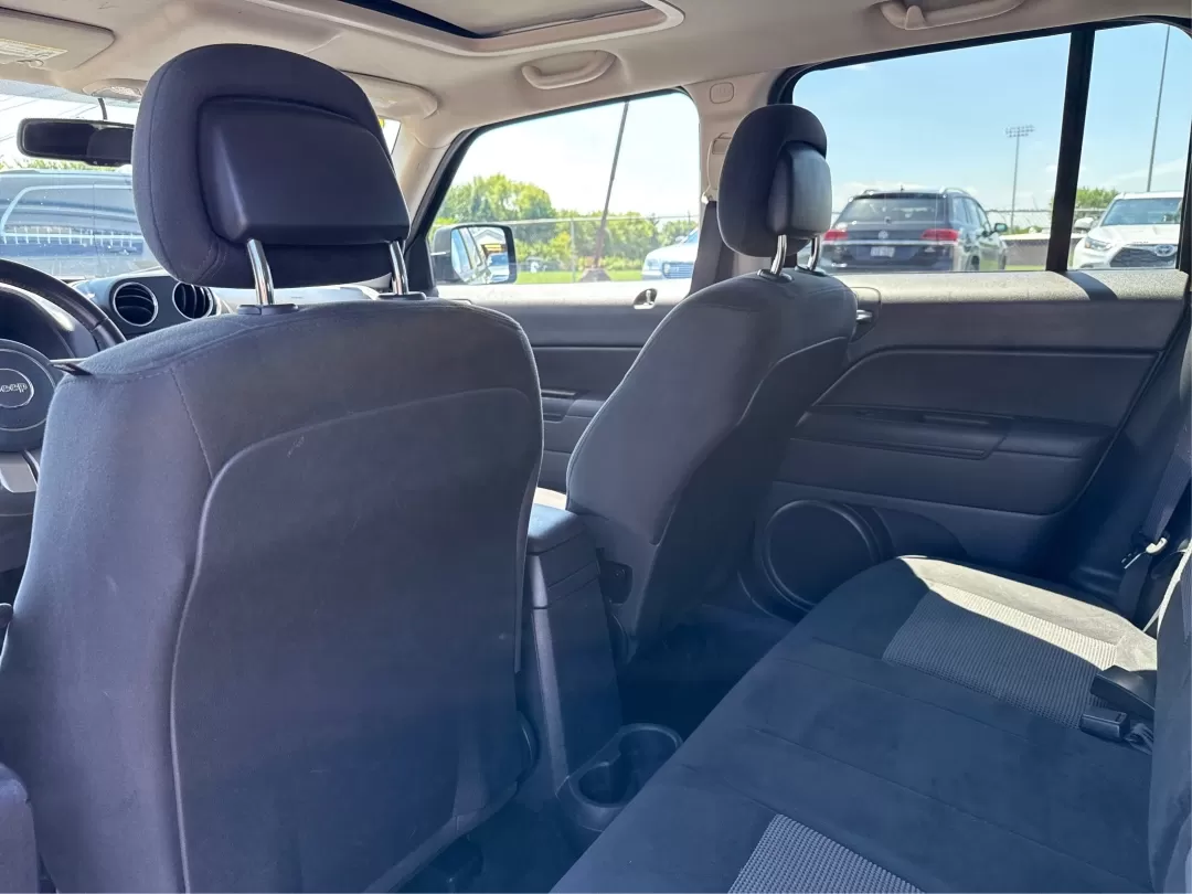 2012 Rescue Green Metallic Jeep Patriot Latitude 4WD (1C4NJRFB8CD) with an 2.4L L4 DOHC 16V engine, located at 1951 S Dayton Lakeview Rd., New Carlisle, OH, 45344, (937) 908-9800, 39.890999, -84.050255 - Photo#10