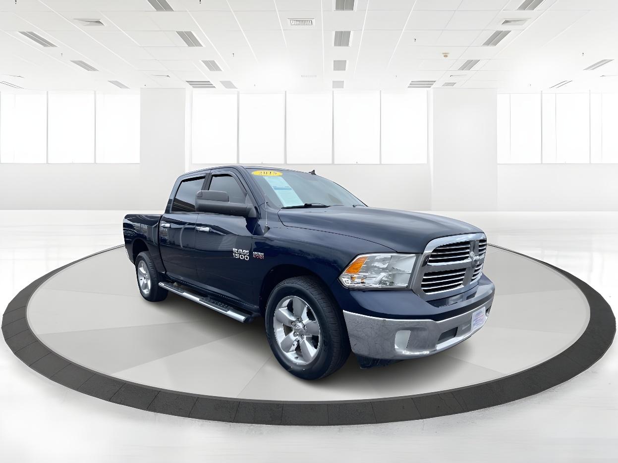 2015 Dark Blue RAM 1500 SLT Crew Cab SWB 4WD (3C6RR7LT8FG) with an 5.7L V8 OHV 16V engine, 8-Speed Automatic transmission, located at 1099 N County Rd 25A , Troy, OH, 45373, (937) 908-9800, 40.057079, -84.212883 - Photo #1