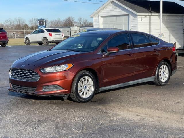 2015 Bronze Fire Met Tinted CC Ford Fusion S (3FA6P0G76FR) with an 2.5L L4 DOHC 16V engine, 6-Speed Automatic transmission, located at 880 E. National Road, Vandalia, OH, 45377, (937) 908-9800, 39.891918, -84.183594 - Photo #2