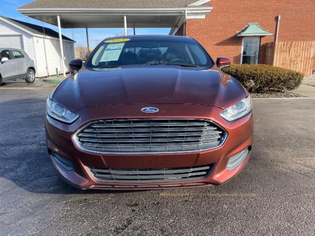2015 Bronze Fire Met Tinted CC Ford Fusion S (3FA6P0G76FR) with an 2.5L L4 DOHC 16V engine, 6-Speed Automatic transmission, located at 880 E. National Road, Vandalia, OH, 45377, (937) 908-9800, 39.891918, -84.183594 - Photo #4