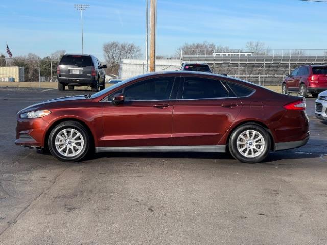 2015 Bronze Fire Met Tinted CC Ford Fusion S (3FA6P0G76FR) with an 2.5L L4 DOHC 16V engine, 6-Speed Automatic transmission, located at 880 E. National Road, Vandalia, OH, 45377, (937) 908-9800, 39.891918, -84.183594 - Photo #8