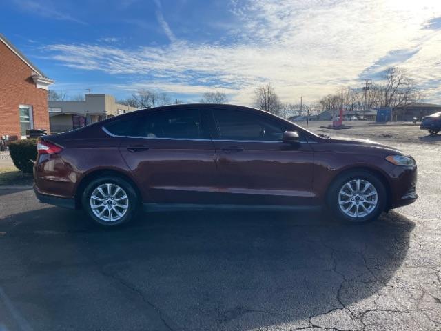 2015 Bronze Fire Met Tinted CC Ford Fusion S (3FA6P0G76FR) with an 2.5L L4 DOHC 16V engine, 6-Speed Automatic transmission, located at 880 E. National Road, Vandalia, OH, 45377, (937) 908-9800, 39.891918, -84.183594 - Photo #10