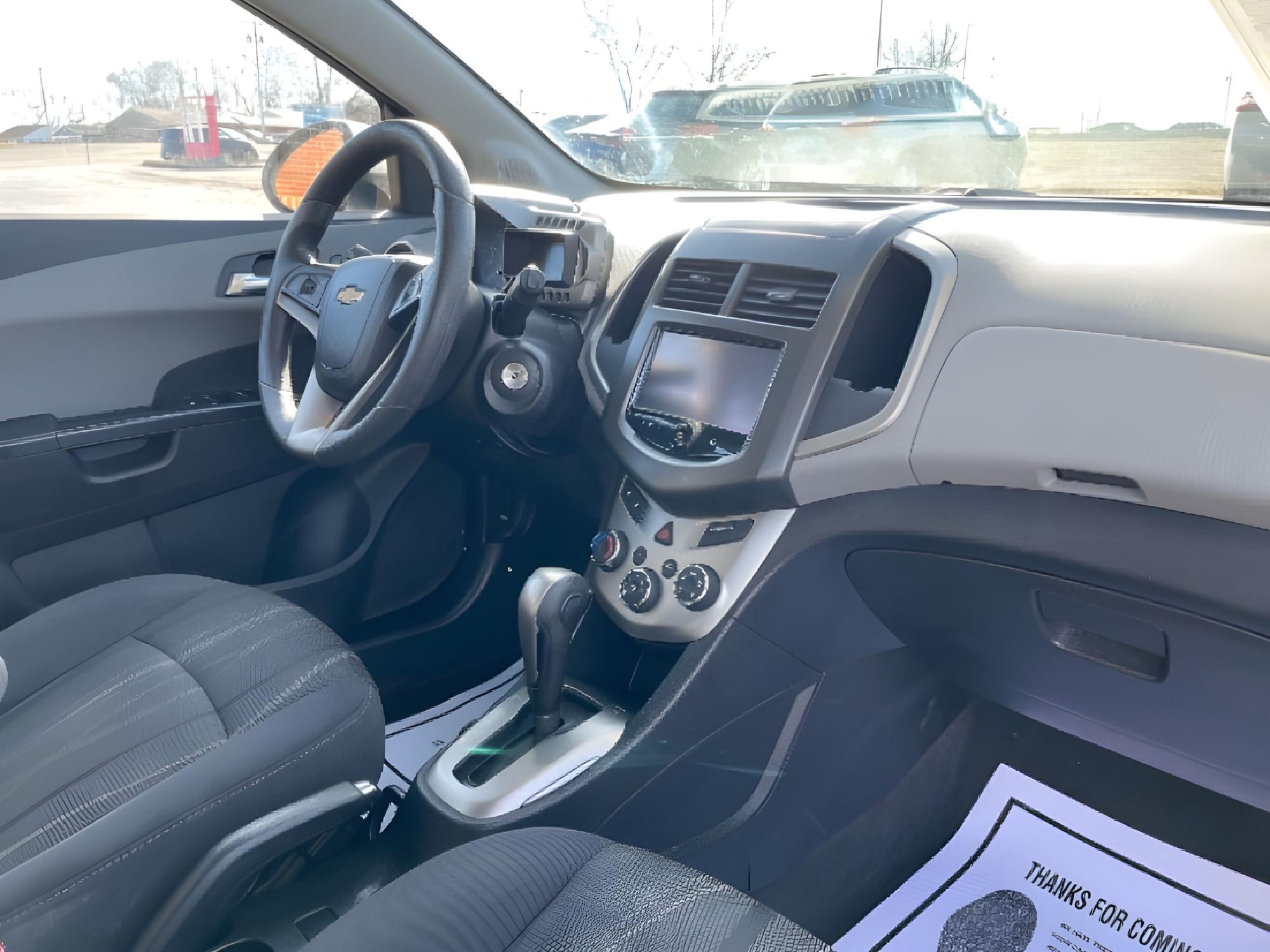 2015 Summit White Chevrolet Sonic LT Auto 5-Door (1G1JC6SHXF4) with an 1.8L L4 DOHC 24V engine, 6-Speed Automatic transmission, located at 880 E. National Road, Vandalia, OH, 45377, (937) 908-9800, 39.891918, -84.183594 - Photo #17
