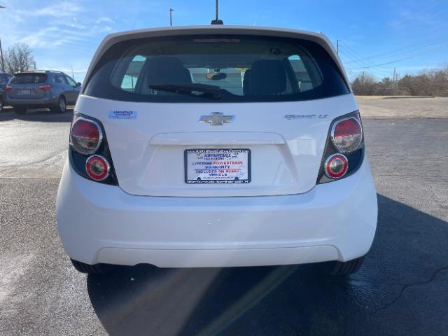 2015 Summit White Chevrolet Sonic LT Auto 5-Door (1G1JC6SHXF4) with an 1.8L L4 DOHC 24V engine, 6-Speed Automatic transmission, located at 880 E. National Road, Vandalia, OH, 45377, (937) 908-9800, 39.891918, -84.183594 - Photo #6