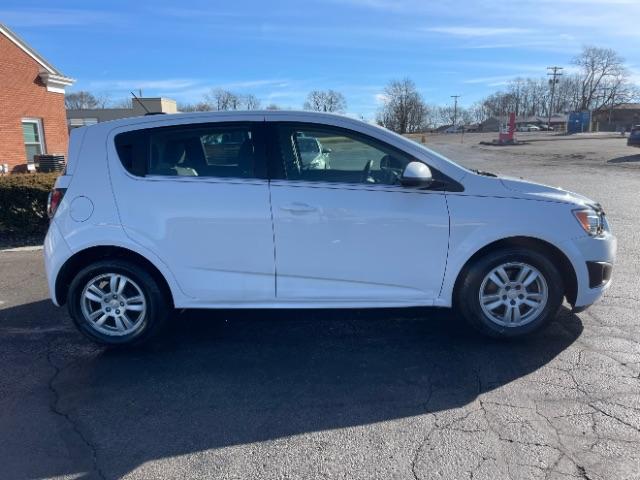 2015 Summit White Chevrolet Sonic LT Auto 5-Door (1G1JC6SHXF4) with an 1.8L L4 DOHC 24V engine, 6-Speed Automatic transmission, located at 880 E. National Road, Vandalia, OH, 45377, (937) 908-9800, 39.891918, -84.183594 - Photo #10