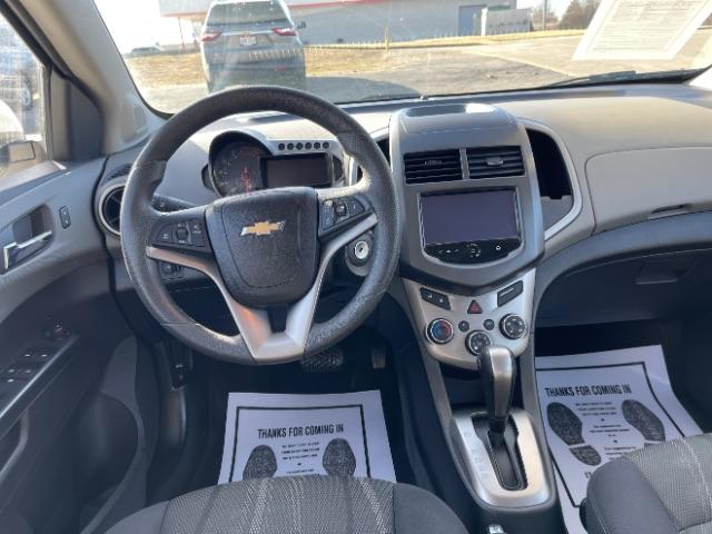2015 Summit White Chevrolet Sonic LT Auto 5-Door (1G1JC6SHXF4) with an 1.8L L4 DOHC 24V engine, 6-Speed Automatic transmission, located at 880 E. National Road, Vandalia, OH, 45377, (937) 908-9800, 39.891918, -84.183594 - Photo #14