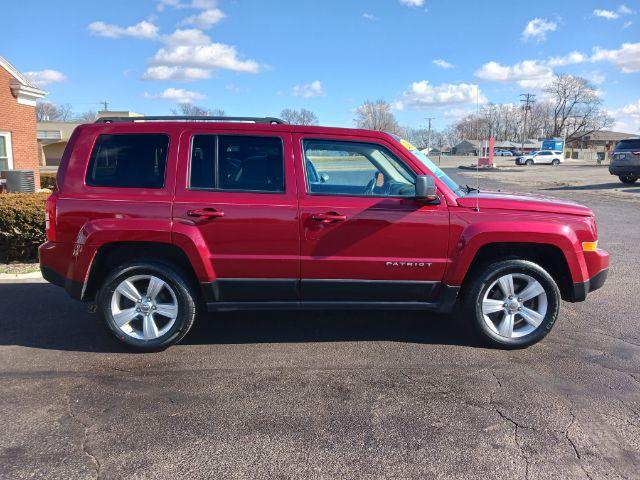 2014 Dp Cherry Red Crystal PC Jeep Patriot Latitude 4WD (1C4NJRFB0ED) with an 2.4L L4 DOHC 16V engine, located at 1230 East Main St, Xenia, OH, 45385, (937) 908-9800, 39.688026, -83.910172 - Photo #8