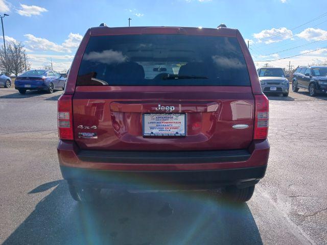 2014 Dp Cherry Red Crystal PC Jeep Patriot Latitude 4WD (1C4NJRFB0ED) with an 2.4L L4 DOHC 16V engine, located at 1230 East Main St, Xenia, OH, 45385, (937) 908-9800, 39.688026, -83.910172 - Photo #10