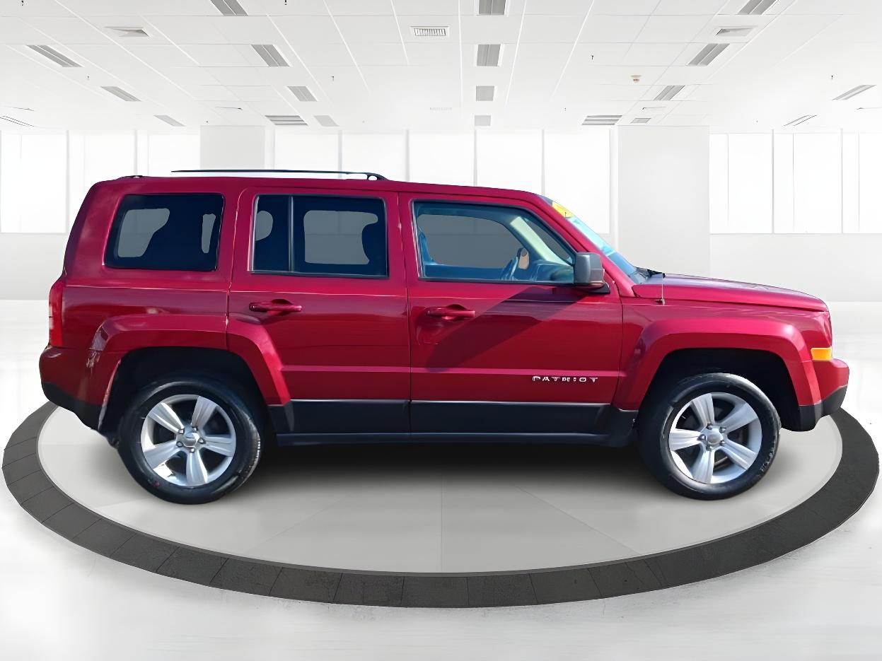 2014 Dp Cherry Red Crystal PC Jeep Patriot Latitude 4WD (1C4NJRFB0ED) with an 2.4L L4 DOHC 16V engine, located at 1230 East Main St, Xenia, OH, 45385, (937) 908-9800, 39.688026, -83.910172 - Photo #3