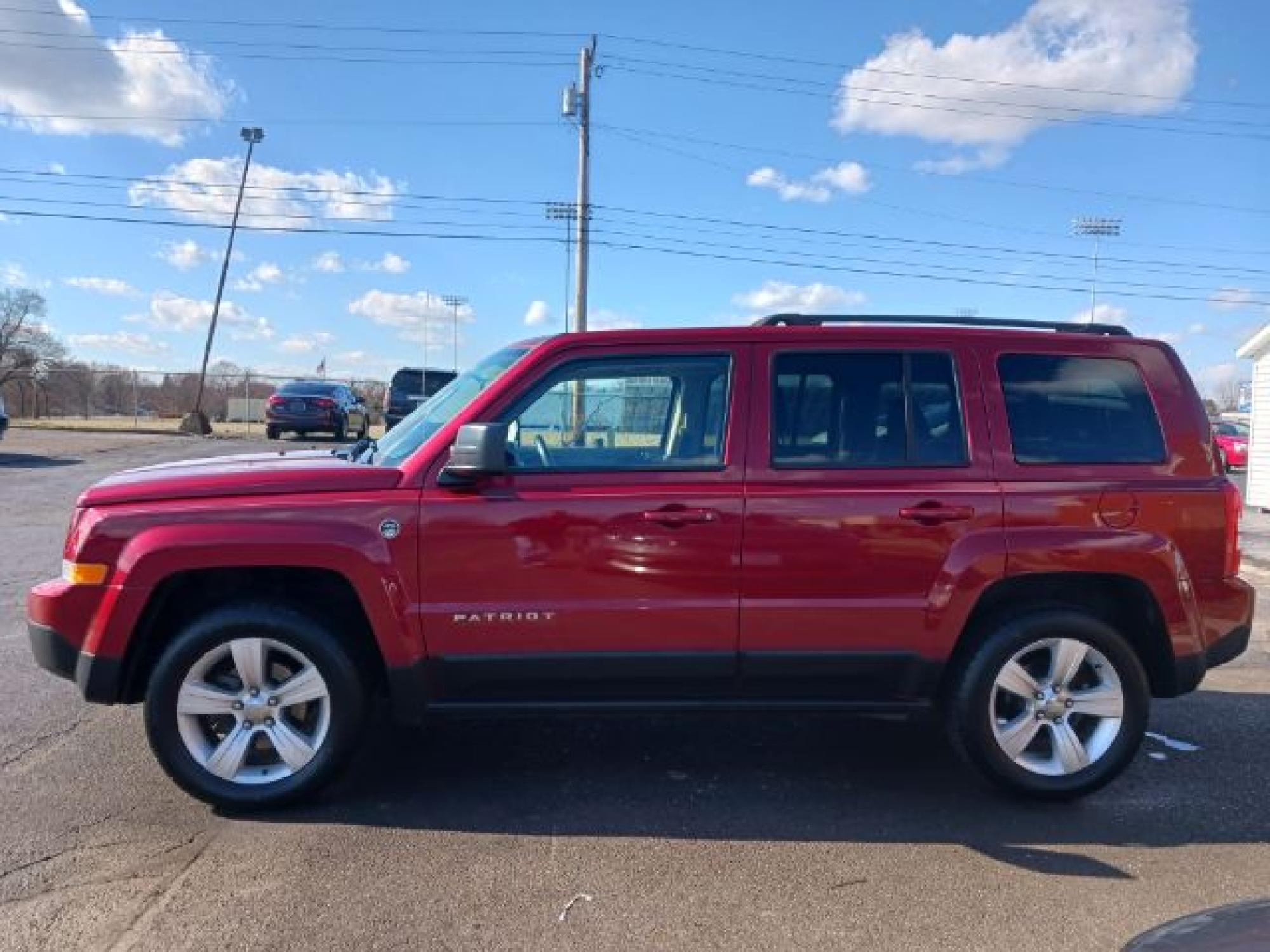 2014 Dp Cherry Red Crystal PC Jeep Patriot Latitude 4WD (1C4NJRFB0ED) with an 2.4L L4 DOHC 16V engine, located at 1230 East Main St, Xenia, OH, 45385, (937) 908-9800, 39.688026, -83.910172 - Photo #25
