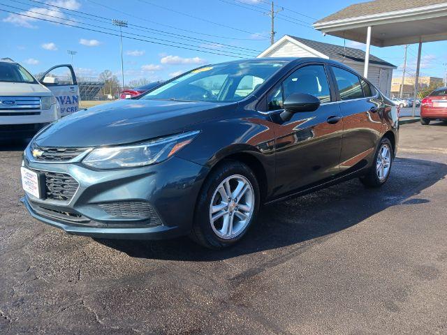 2017 Pepperdust Metallic Chevrolet Cruze LT Auto (3G1BE5SM0HS) with an 1.4L L4 DOHC 16V TURBO engine, 6-Speed Automatic transmission, located at 1099 N County Rd 25A , Troy, OH, 45373, (937) 908-9800, 40.057079, -84.212883 - Photo #4