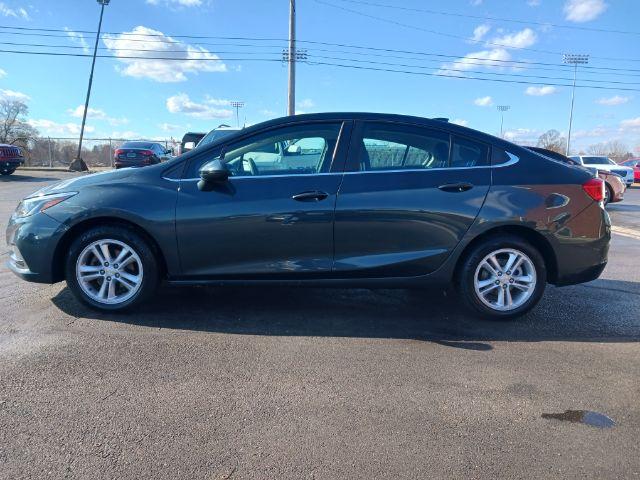 2017 Pepperdust Metallic Chevrolet Cruze LT Auto (3G1BE5SM0HS) with an 1.4L L4 DOHC 16V TURBO engine, 6-Speed Automatic transmission, located at 1230 East Main St, Xenia, OH, 45385, (937) 908-9800, 39.688026, -83.910172 - Photo #6