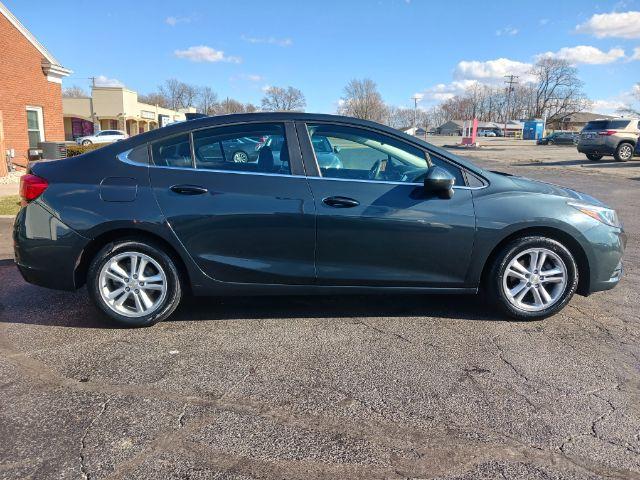 2017 Pepperdust Metallic Chevrolet Cruze LT Auto (3G1BE5SM0HS) with an 1.4L L4 DOHC 16V TURBO engine, 6-Speed Automatic transmission, located at 1099 N County Rd 25A, Troy, OH, 45373, (937) 908-9800, 40.057079, -84.212883 - Photo #8