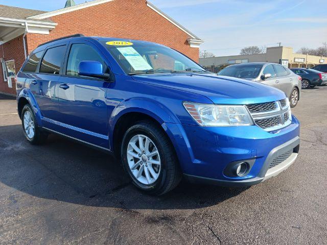 2015 Blue Streak Pearlcoat Dodge Journey SXT (3C4PDCBG2FT) with an 3.6L V6 DOHC 24V engine, 6-Speed Automatic transmission, located at 1099 N County Rd 25A, Troy, OH, 45373, (937) 908-9800, 40.057079, -84.212883 - Photo #0