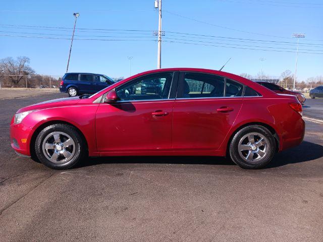 2014 Red Hot Chevrolet Cruze 1LT Auto (1G1PC5SB2E7) with an 1.4L L4 DOHC 16V TURBO engine, 6-Speed Automatic transmission, located at 1184 Kauffman Ave, Fairborn, OH, 45324, (937) 908-9800, 39.807072, -84.030914 - Photo #6