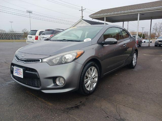 2014 Graphite Steel Kia Forte Koup EX (KNAFX6A86E5) with an 2.0L L4 DOHC 16V engine, 6-Speed Automatic transmission, located at 401 Woodman Dr, Riverside, OH, 45431, (937) 908-9800, 39.760899, -84.123421 - Photo #4