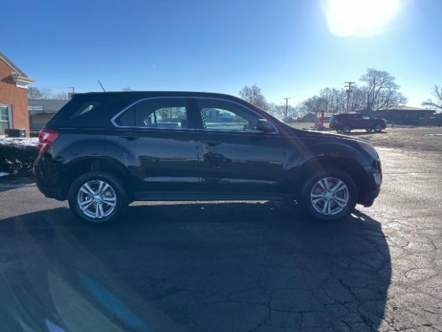 2017 Black Chevrolet Equinox LS 2WD (2GNALBEK7H1) with an 2.4L L4 DOHC 16V FFV engine, 6-Speed Automatic transmission, located at 1184 Kauffman Ave, Fairborn, OH, 45324, (937) 908-9800, 39.807072, -84.030914 - Photo #8