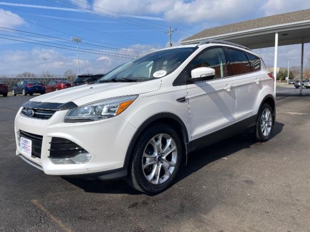2015 White Platinum Met TC Ford Escape Titanium 4WD (1FMCU9J92FU) with an 2.0L L4 DOHC 16V engine, 6-Speed Automatic transmission, located at 880 E. National Road, Vandalia, OH, 45377, (937) 908-9800, 39.891918, -84.183594 - Photo #2