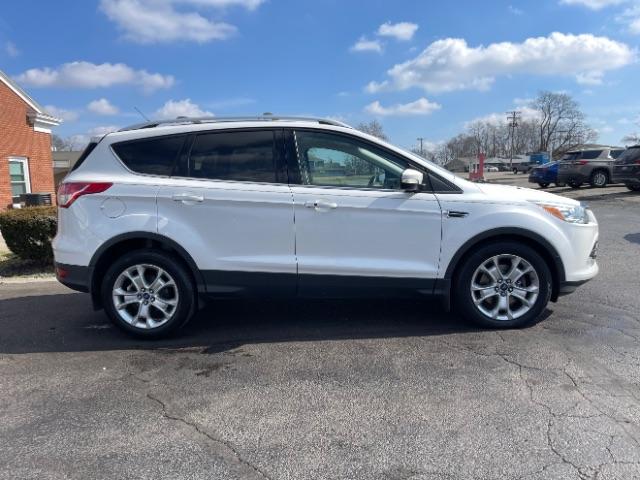 2015 White Platinum Met TC Ford Escape Titanium 4WD (1FMCU9J92FU) with an 2.0L L4 DOHC 16V engine, 6-Speed Automatic transmission, located at 880 E. National Road, Vandalia, OH, 45377, (937) 908-9800, 39.891918, -84.183594 - Photo #6