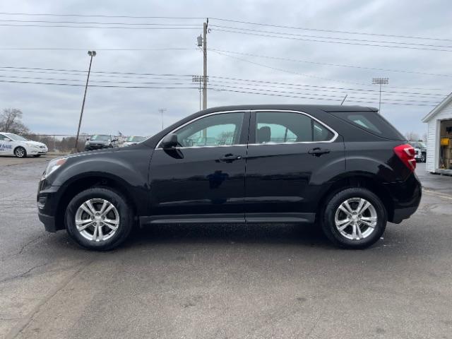 2017 Black Chevrolet Equinox LS 2WD (2GNALBEK2H1) with an 2.4L L4 DOHC 16V FFV engine, 6-Speed Automatic transmission, located at 1184 Kauffman Ave, Fairborn, OH, 45324, (937) 908-9800, 39.807072, -84.030914 - Photo #4