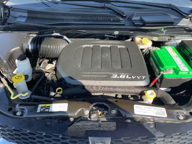 2015 Billet Silver Metallic CC Dodge Grand Caravan SXT (2C4RDGCG7FR) with an 3.6L V6 DOHC 24V engine, 6-Speed Automatic transmission, located at 401 Woodman Dr, Riverside, OH, 45431, (937) 908-9800, 39.760899, -84.123421 - Photo #26