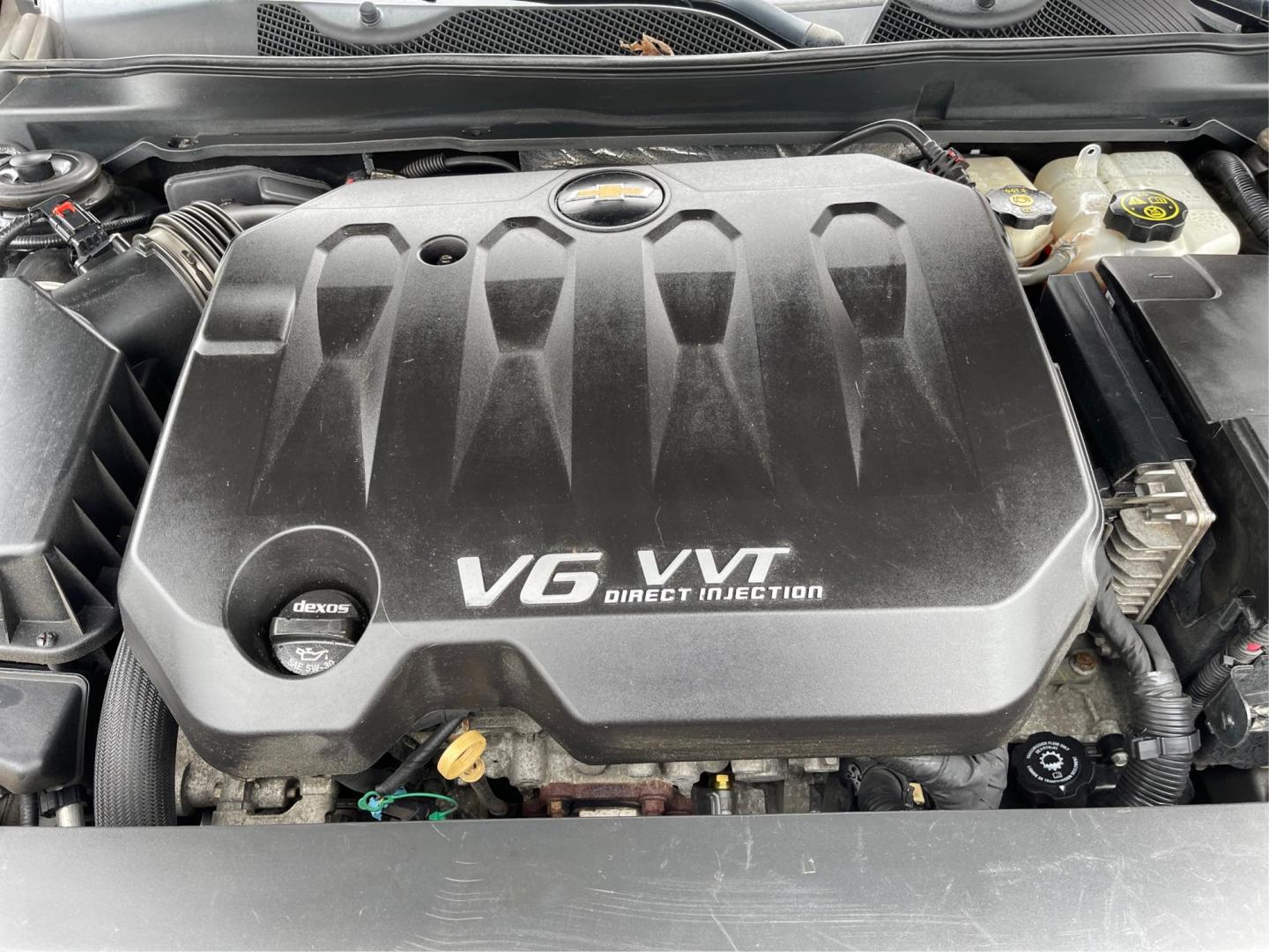 2014 Black Chevrolet Impala 2LT (2G1125S32E9) with an 3.6L V6 DOHC 24VV FFV engine, 6-Speed Automatic transmission, located at 1099 N County Rd 25A, Troy, OH, 45373, (937) 908-9800, 40.057079, -84.212883 - Photo#10
