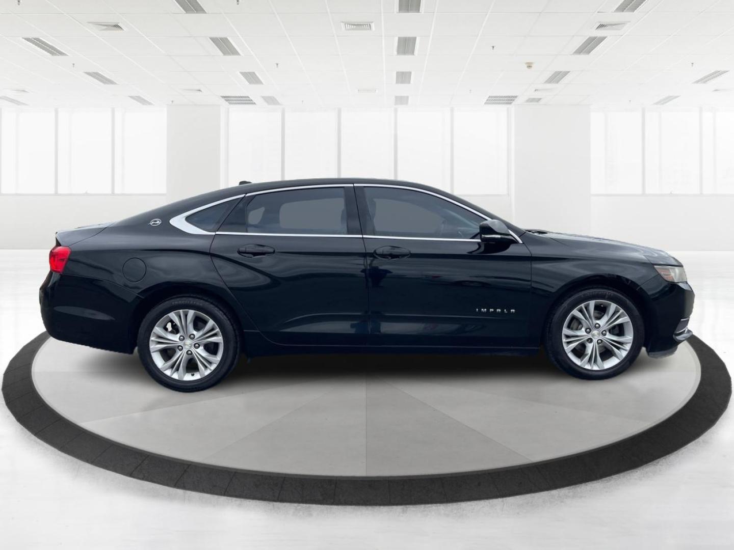 2014 Black Chevrolet Impala 2LT (2G1125S32E9) with an 3.6L V6 DOHC 24VV FFV engine, 6-Speed Automatic transmission, located at 1099 N County Rd 25A, Troy, OH, 45373, (937) 908-9800, 40.057079, -84.212883 - Photo#1