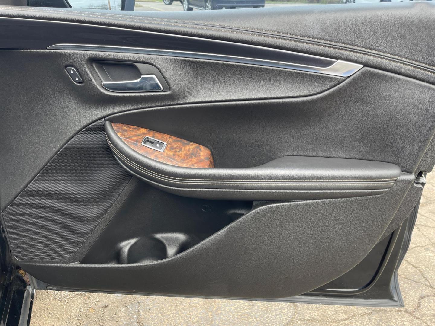 2014 Black Chevrolet Impala 2LT (2G1125S32E9) with an 3.6L V6 DOHC 24VV FFV engine, 6-Speed Automatic transmission, located at 1099 N County Rd 25A, Troy, OH, 45373, (937) 908-9800, 40.057079, -84.212883 - Photo#19