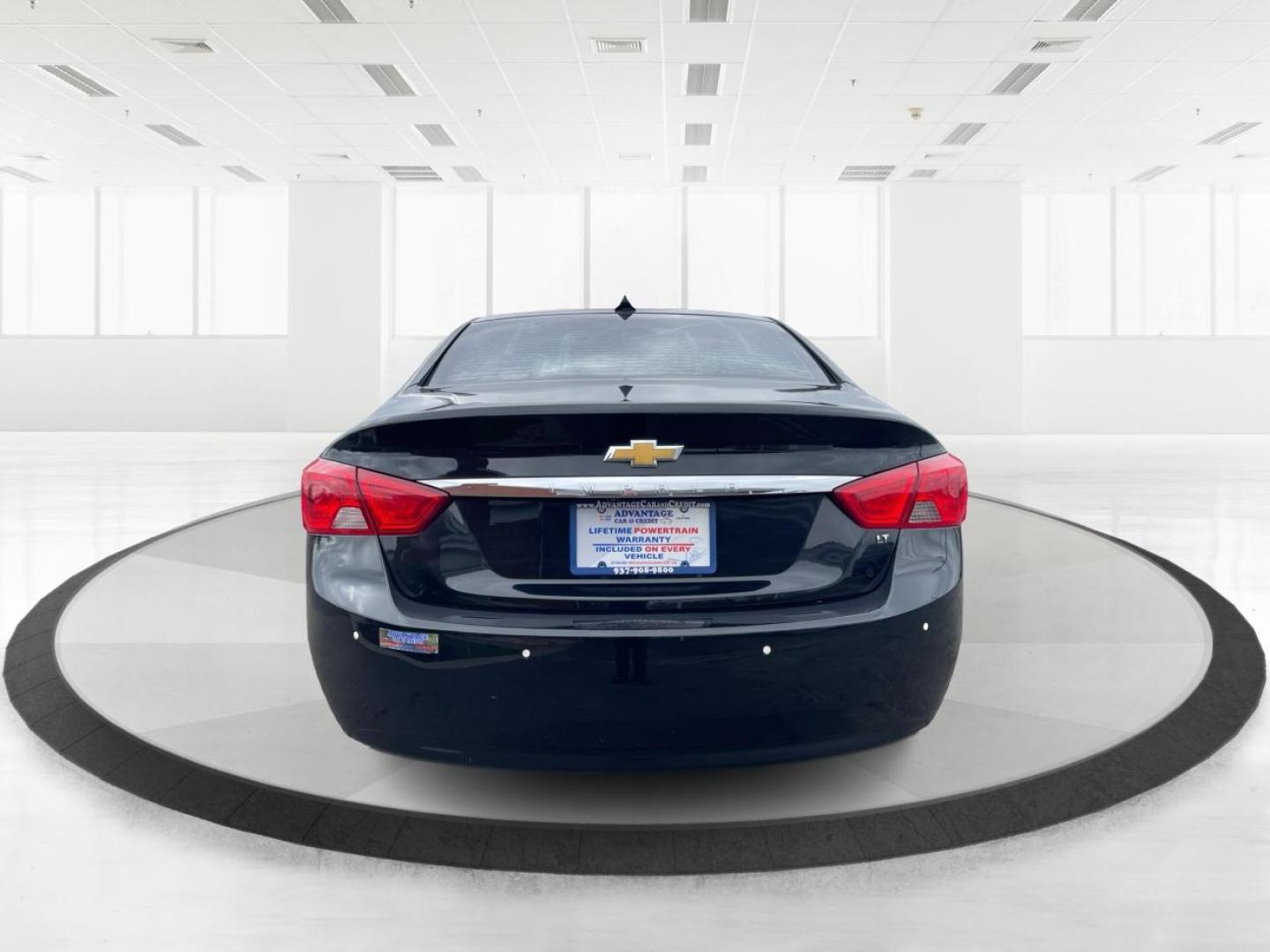 2014 Black Chevrolet Impala 2LT (2G1125S32E9) with an 3.6L V6 DOHC 24VV FFV engine, 6-Speed Automatic transmission, located at 1099 N County Rd 25A, Troy, OH, 45373, (937) 908-9800, 40.057079, -84.212883 - Photo#3