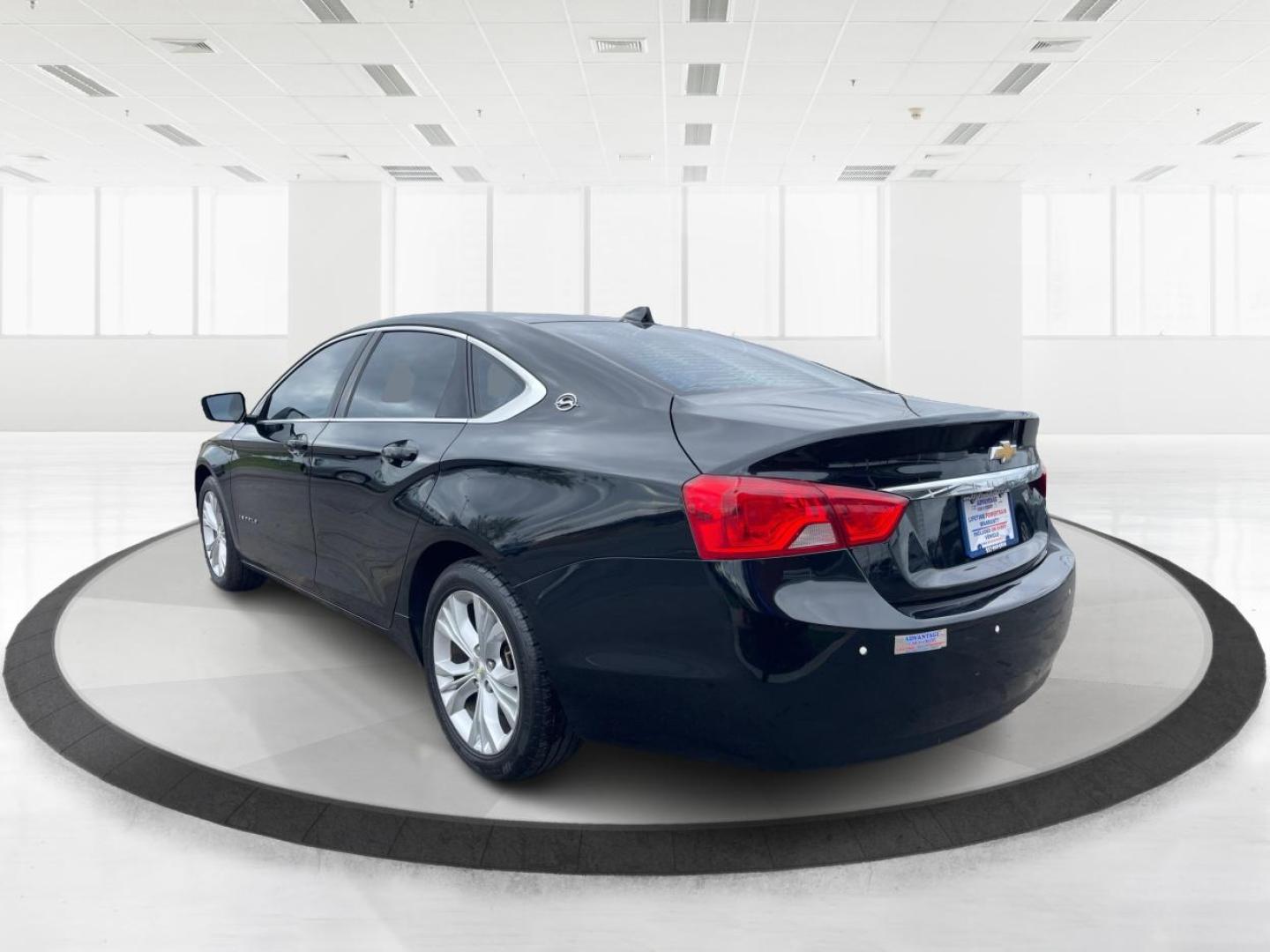 2014 Black Chevrolet Impala 2LT (2G1125S32E9) with an 3.6L V6 DOHC 24VV FFV engine, 6-Speed Automatic transmission, located at 1099 N County Rd 25A, Troy, OH, 45373, (937) 908-9800, 40.057079, -84.212883 - Photo#4