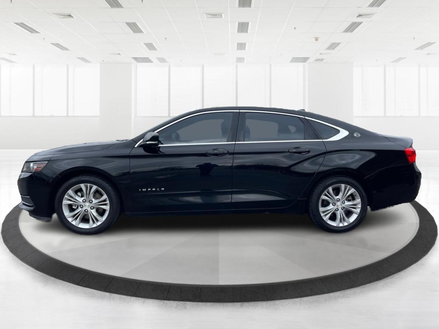 2014 Black Chevrolet Impala 2LT (2G1125S32E9) with an 3.6L V6 DOHC 24VV FFV engine, 6-Speed Automatic transmission, located at 1099 N County Rd 25A, Troy, OH, 45373, (937) 908-9800, 40.057079, -84.212883 - Photo#5