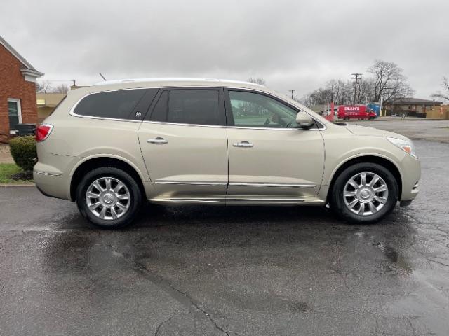 2014 Champagne Silver Metallic Buick Enclave Premium AWD (5GAKVCKD5EJ) with an 3.6L V6 DOHC 24V engine, 6-Speed Automatic Overdrive transmission, located at 4508 South Dixie Dr, Moraine, OH, 45439, (937) 908-9800, 39.689976, -84.218452 - Photo #4