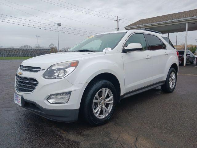 2017 Summit White Chevrolet Equinox LT 2WD (2GNALCEK8H1) with an 2.4L L4 DOHC 16V FFV engine, 6-Speed Automatic transmission, located at 4508 South Dixie Dr, Moraine, OH, 45439, (937) 908-9800, 39.689976, -84.218452 - Photo #4