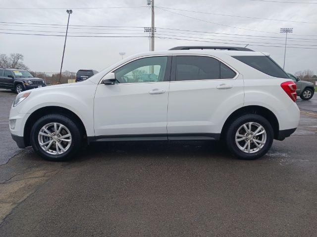 2017 Summit White Chevrolet Equinox LT 2WD (2GNALCEK8H1) with an 2.4L L4 DOHC 16V FFV engine, 6-Speed Automatic transmission, located at 4508 South Dixie Dr, Moraine, OH, 45439, (937) 908-9800, 39.689976, -84.218452 - Photo #6