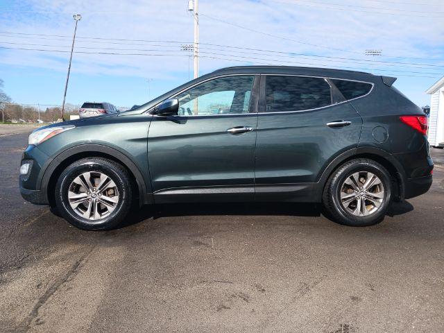 2013 Juniper Green Hyundai Santa Fe Sport 2.4 FWD (5XYZU3LB8DG) with an 2.4L L4 DOHC 16V engine, 6-Speed Automatic transmission, located at 1230 East Main St, Xenia, OH, 45385, (937) 908-9800, 39.688026, -83.910172 - Photo #6