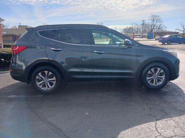 2013 Juniper Green Hyundai Santa Fe Sport 2.4 FWD (5XYZU3LB8DG) with an 2.4L L4 DOHC 16V engine, 6-Speed Automatic transmission, located at 1230 East Main St, Xenia, OH, 45385, (937) 908-9800, 39.688026, -83.910172 - Photo #8