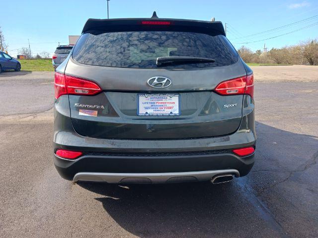 2013 Juniper Green Hyundai Santa Fe Sport 2.4 FWD (5XYZU3LB8DG) with an 2.4L L4 DOHC 16V engine, 6-Speed Automatic transmission, located at 1230 East Main St, Xenia, OH, 45385, (937) 908-9800, 39.688026, -83.910172 - Photo #10