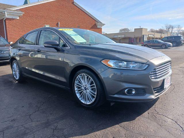 2016 Shadow Black Ford Fusion SE AWD (3FA6P0T99GR) with an 2.0L L4 DOHC 16V engine, 6-Speed Automatic transmission, located at 1099 N County Rd 25A , Troy, OH, 45373, (937) 908-9800, 40.057079, -84.212883 - Photo #0