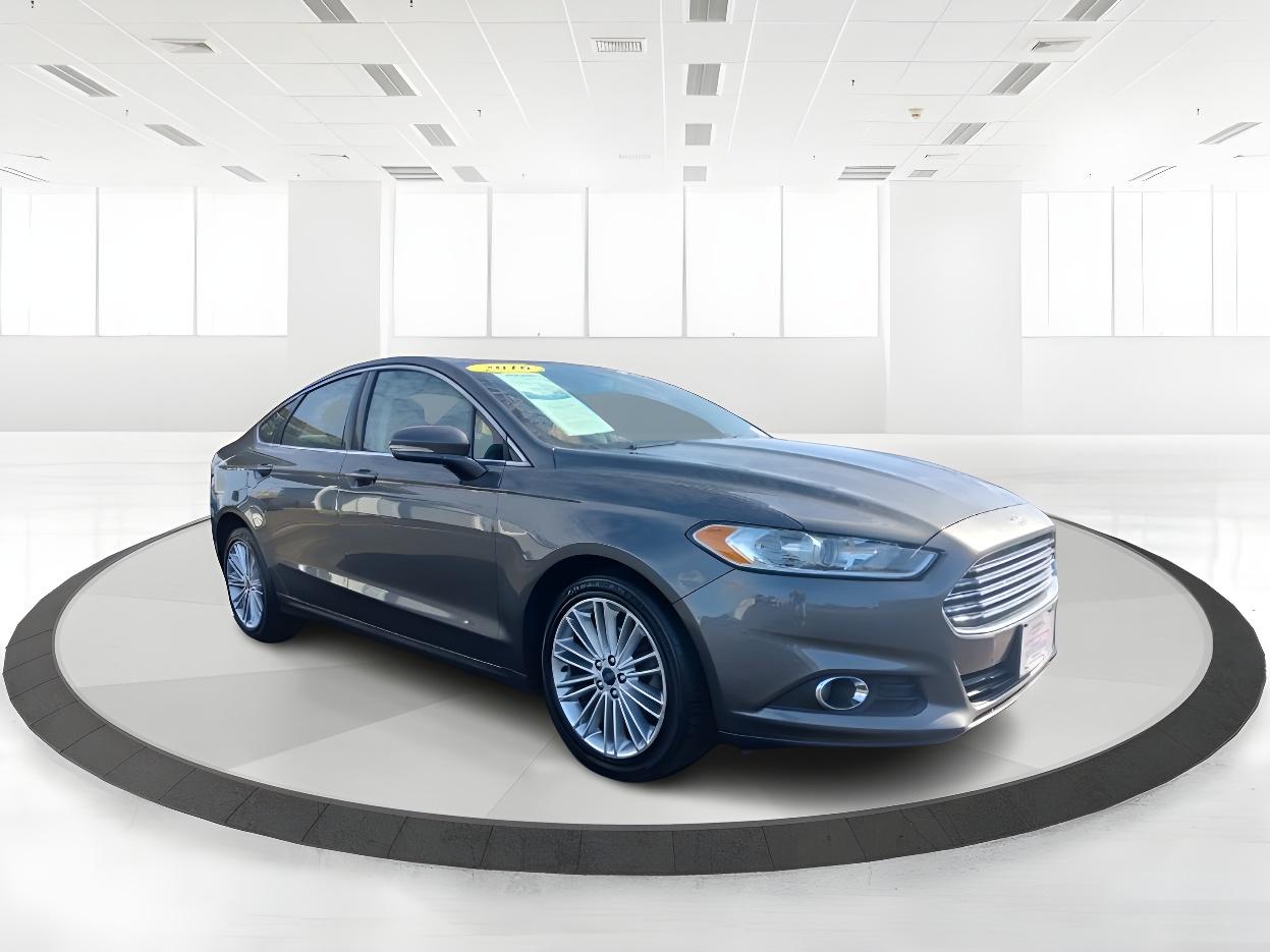 2016 Shadow Black Ford Fusion SE AWD (3FA6P0T99GR) with an 2.0L L4 DOHC 16V engine, 6-Speed Automatic transmission, located at 1099 N County Rd 25A , Troy, OH, 45373, (937) 908-9800, 40.057079, -84.212883 - Photo #1