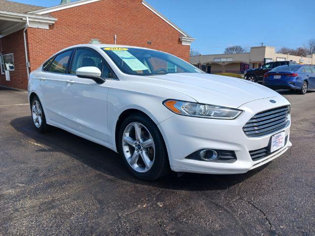 2016 Oxford White Clearcoat Ford Fusion S (3FA6P0G78GR) with an 2.5L L4 DOHC 16V engine, 6-Speed Automatic transmission, located at 1184 Kauffman Ave, Fairborn, OH, 45324, (937) 908-9800, 39.807072, -84.030914 - Photo #0