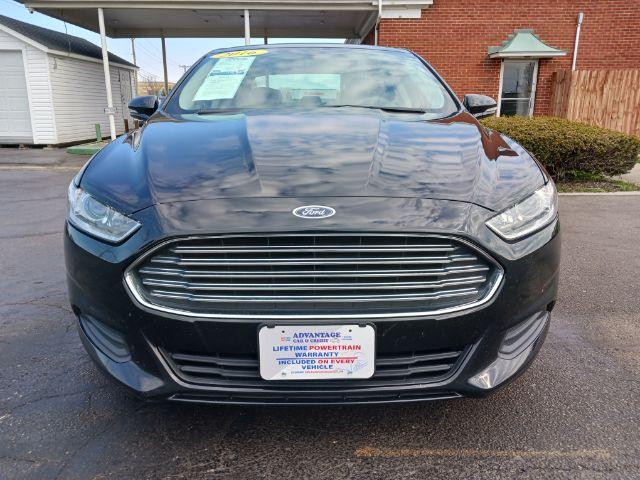 2016 Shadow Black Ford Fusion SE (3FA6P0H75GR) with an 2.5L L4 DOHC 16V engine, 6-Speed Automatic transmission, located at 401 Woodman Dr, Riverside, OH, 45431, (937) 908-9800, 39.760899, -84.123421 - Photo #2