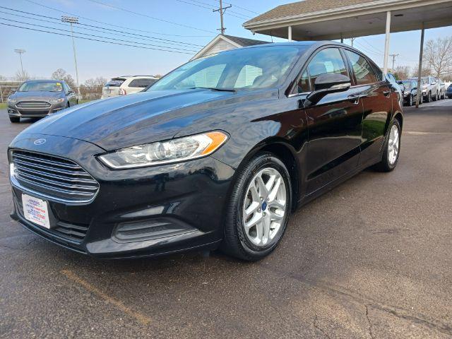 2016 Shadow Black Ford Fusion SE (3FA6P0H75GR) with an 2.5L L4 DOHC 16V engine, 6-Speed Automatic transmission, located at 401 Woodman Dr, Riverside, OH, 45431, (937) 908-9800, 39.760899, -84.123421 - Photo #4