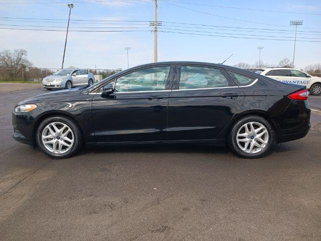 2016 Shadow Black Ford Fusion SE (3FA6P0H75GR) with an 2.5L L4 DOHC 16V engine, 6-Speed Automatic transmission, located at 401 Woodman Dr, Riverside, OH, 45431, (937) 908-9800, 39.760899, -84.123421 - Photo #6