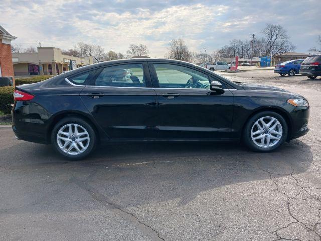 2016 Shadow Black Ford Fusion SE (3FA6P0H75GR) with an 2.5L L4 DOHC 16V engine, 6-Speed Automatic transmission, located at 401 Woodman Dr, Riverside, OH, 45431, (937) 908-9800, 39.760899, -84.123421 - Photo #8